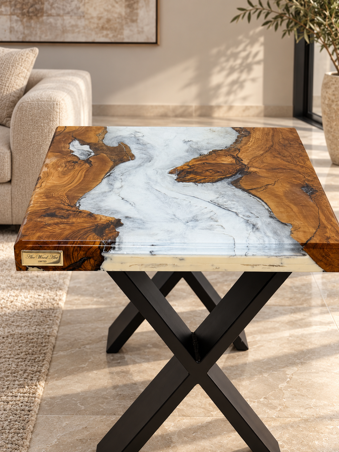 A view of the table's base showing the X-leg design.