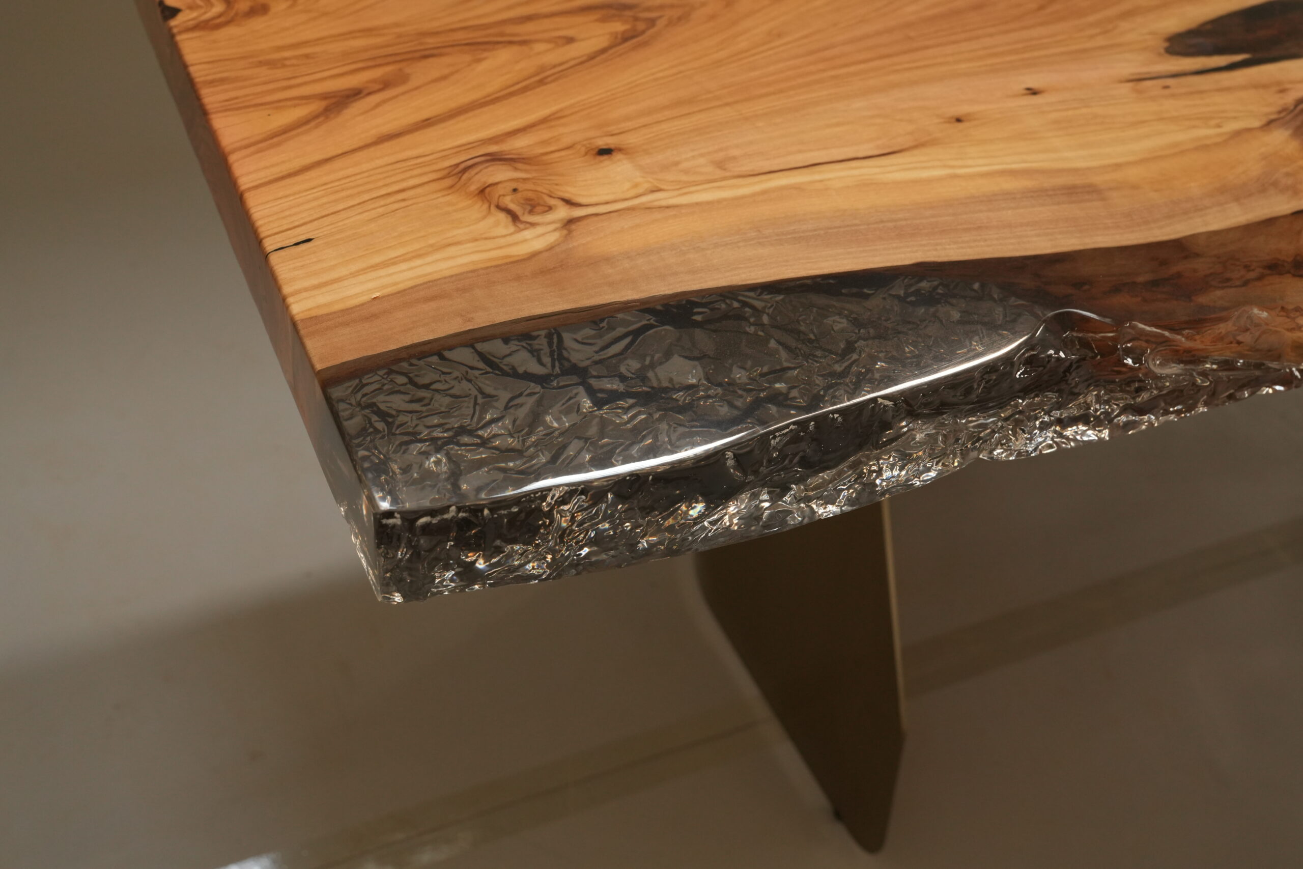 Close-up view focusing on the olive wood texture.