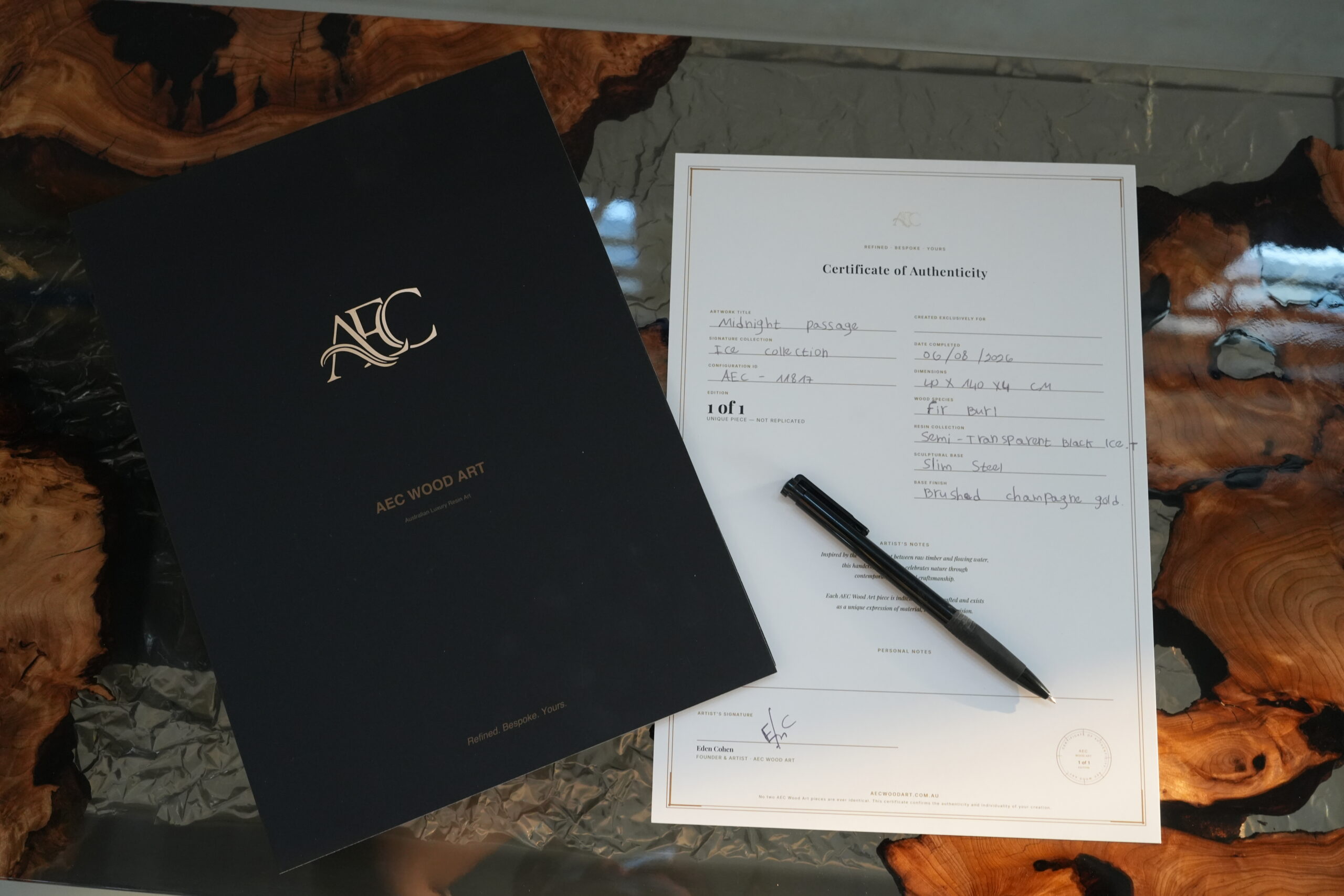 Certificate of authenticity placed on the Midnight Ice Console surface.