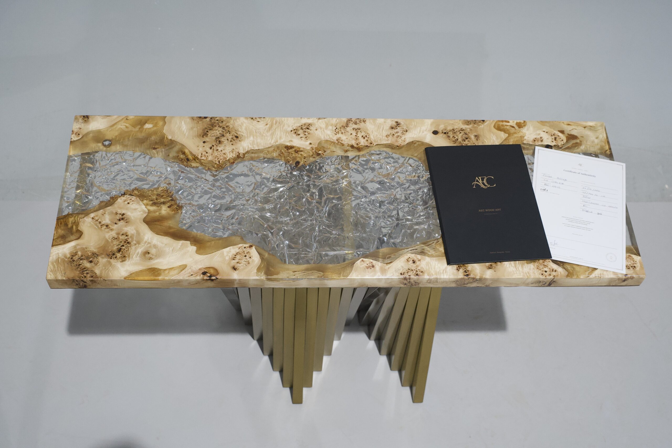 Top view of the Frozen Passage Console Table showcasing poplar wood and clear epoxy.