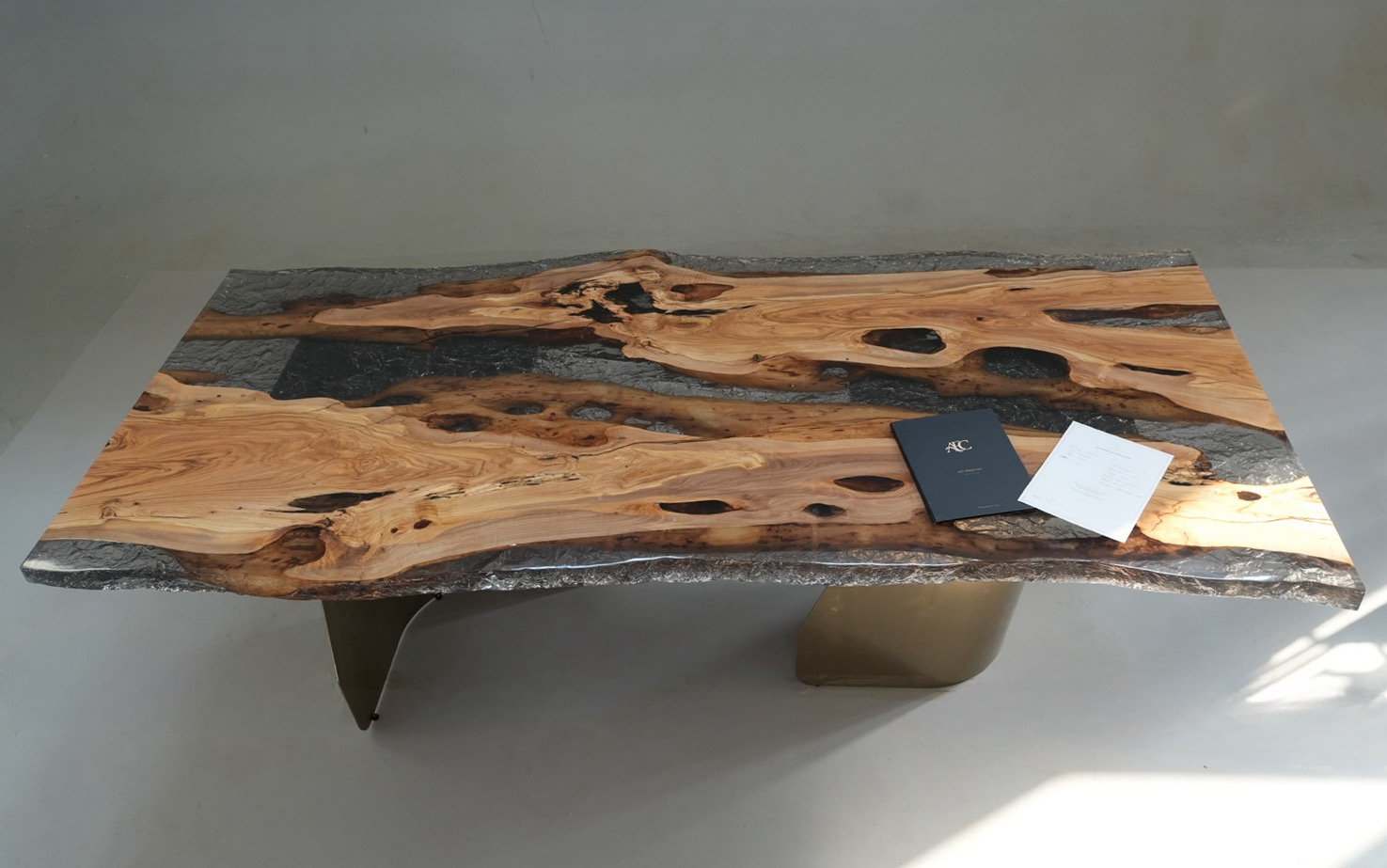 Top-down view of the table displaying natural wood patterns and epoxy finish.