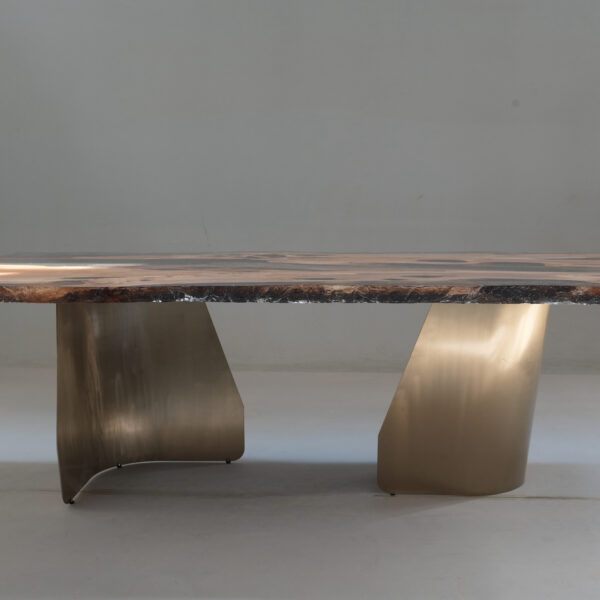 Side view of the Crystal Black Olive Dining Table highlighting the architectural leg.