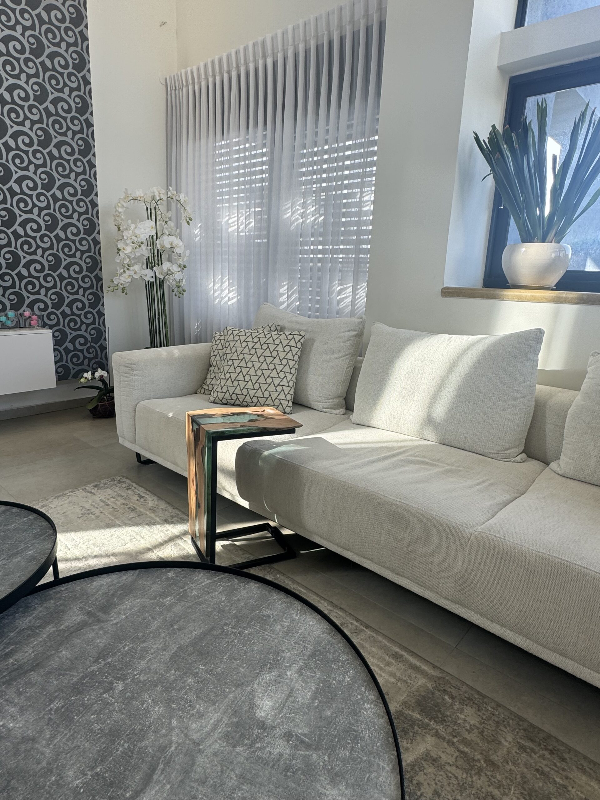 The side table integrated into the living space, displaying its functionality and design.